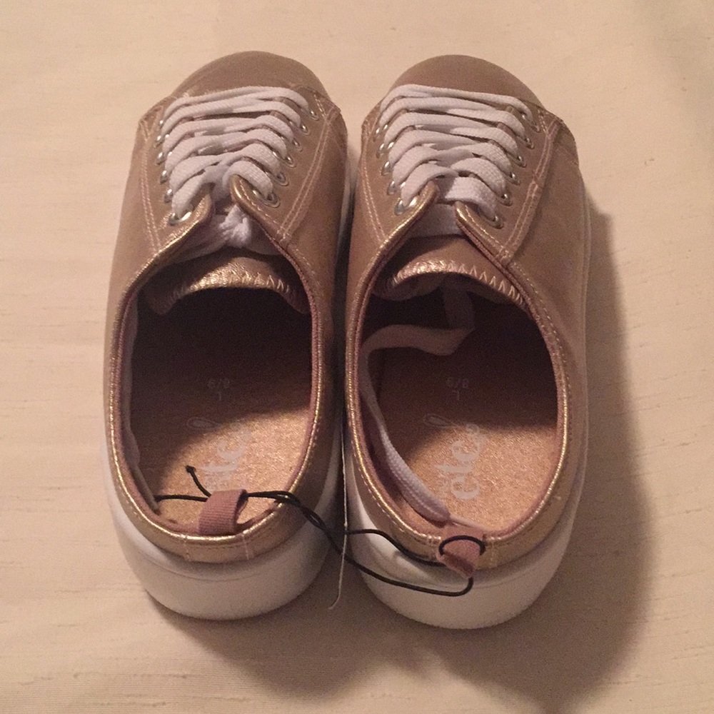 Golden lace up platforms